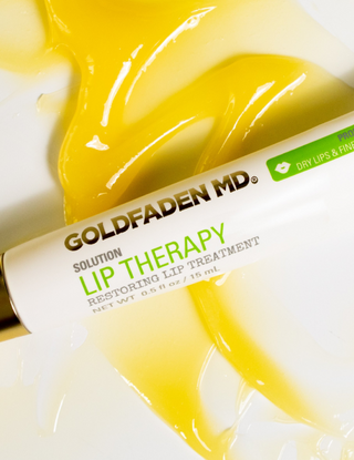 Lip Therapy close up with product behind it